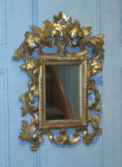 SMALL ITALIAN CARVED GILTWOOD MIRROR 1 SMALL ITALIAN CARVED GILTWOOD MIRROR